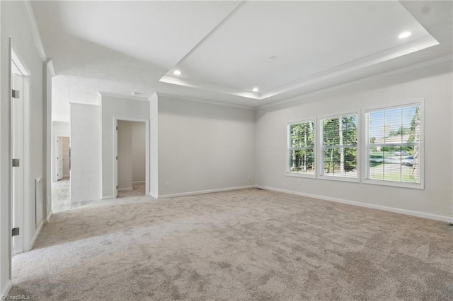 2875 Motsinger Rd, Winston-Salem, NC 27107 - spare room featuring crown molding, a tray ceiling, light carpet, and recessed lighting