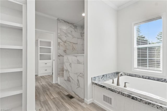 2875 Motsinger Rd, Winston-Salem, NC 27107 - bathroom with a garden tub, crown molding, a marble finish shower, and wood finished floors