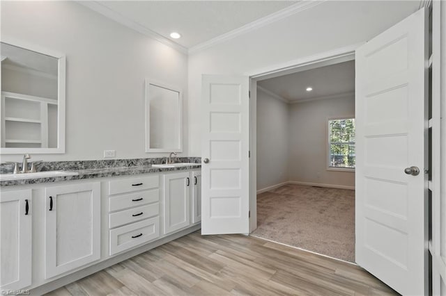 2875 Motsinger Rd, Winston-Salem, NC 27107 - bathroom with crown molding, double vanity, recessed lighting, and wood finished floors