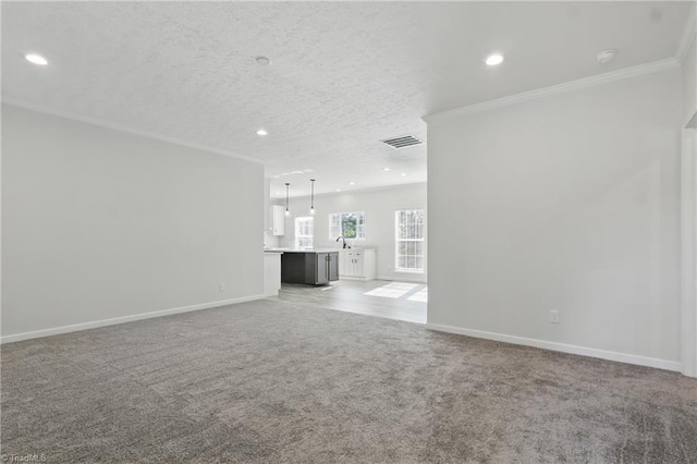 2875 Motsinger Rd, Winston-Salem, NC 27107 - unfurnished living room featuring carpet flooring, crown molding, recessed lighting, and a textured ceiling