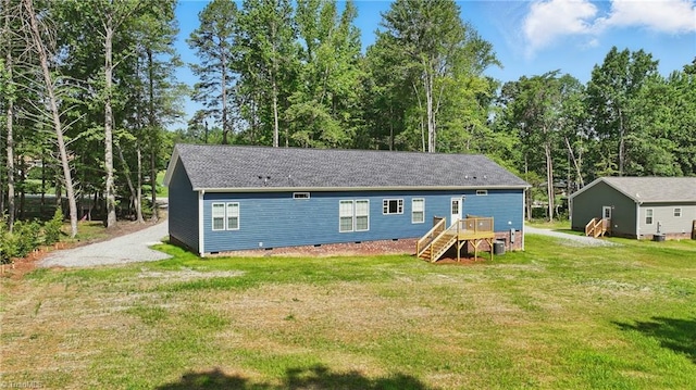 2875 Motsinger Rd, Winston-Salem, NC 27107 - rear view of house featuring crawl space, a yard, roof with shingles, view of scattered trees, and stairway