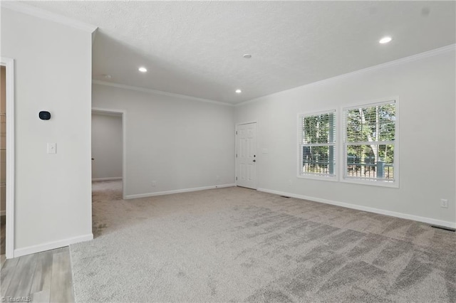 2875 Motsinger Rd, Winston-Salem, NC 27107 - empty room with crown molding, recessed lighting, a textured ceiling, and light carpet