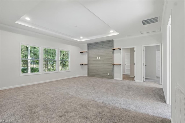 2875 Motsinger Rd, Winston-Salem, NC 27107 - spare room featuring a tray ceiling, recessed lighting, light carpet, attic access, and ornamental molding