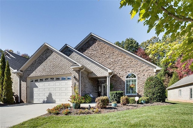 view of front facade with a garage and a front yard