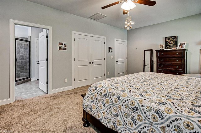 bedroom with light carpet and ceiling fan