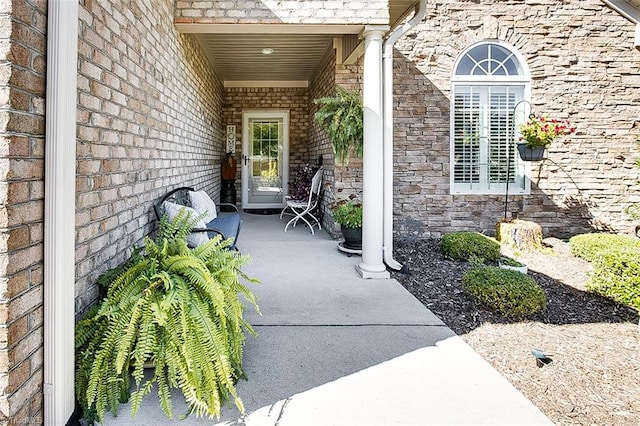 doorway to property with a patio