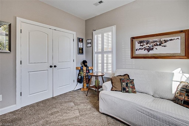 living area with carpet flooring