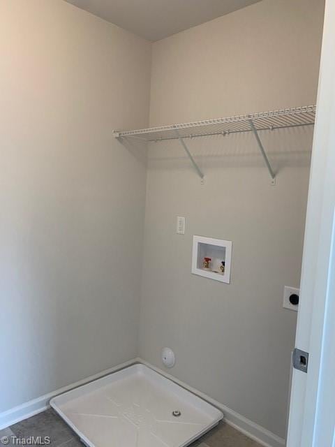 laundry area with hookup for an electric dryer and washer hookup