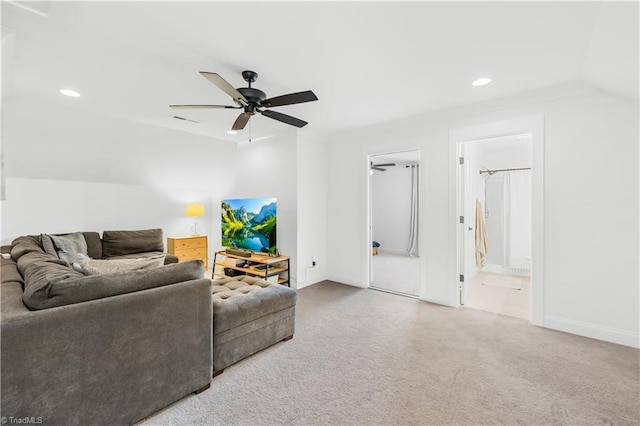 carpeted living room with vaulted ceiling, a ceiling fan, baseboards, visible vents, and recessed lighting