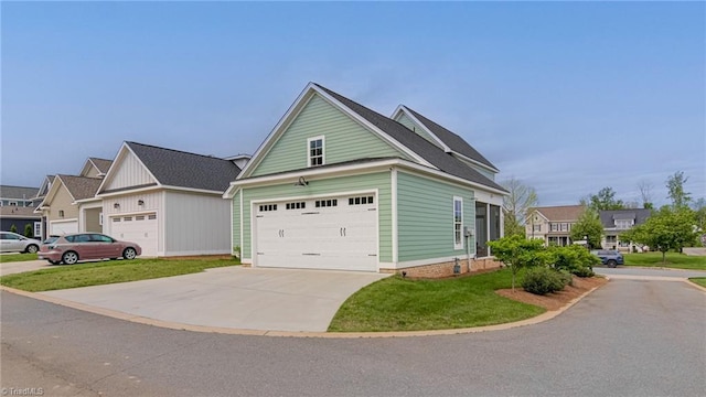 view of side of home featuring an attached garage, a lawn, and concrete driveway