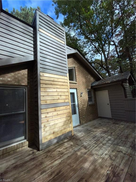 exterior space featuring a wooden deck