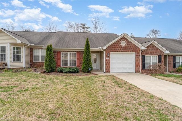 ranch-style home featuring a garage, concrete driveway, brick siding, and a front yard