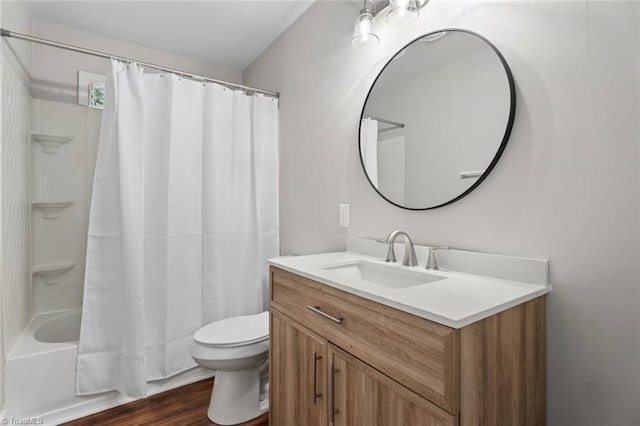 2505 Druid Hills Dr, Winston-Salem, NC 27105 - bathroom with vanity, shower / tub combo with curtain, and wood finished floors