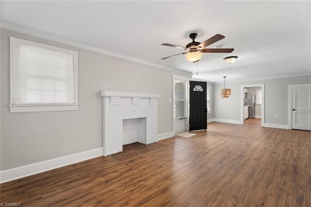 2505 Druid Hills Dr, Winston-Salem, NC 27105 - unfurnished living room featuring a ceiling fan, wood finished floors, ornamental molding, and a brick fireplace