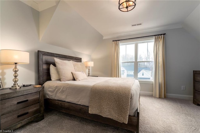 bedroom with carpet flooring, visible vents, baseboards, and vaulted ceiling