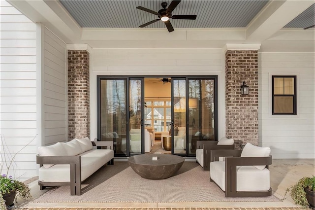 view of patio with an outdoor hangout area and ceiling fan