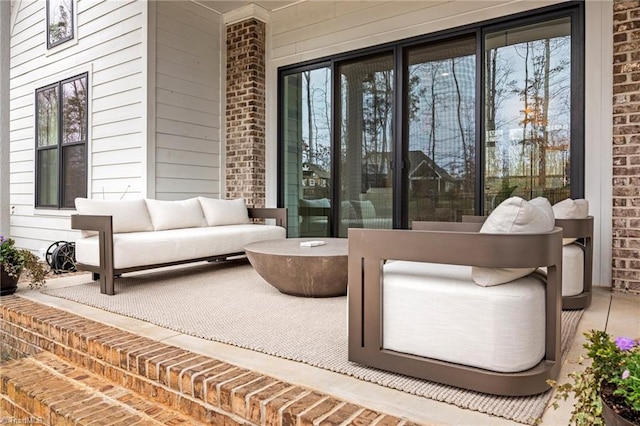 exterior space featuring wood walls and brick wall