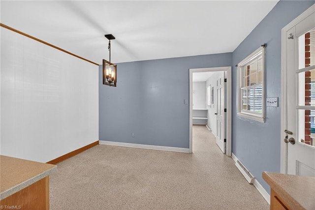 1409 Coventry Rd, High Point, NC 27262 - unfurnished room with baseboards and a chandelier
