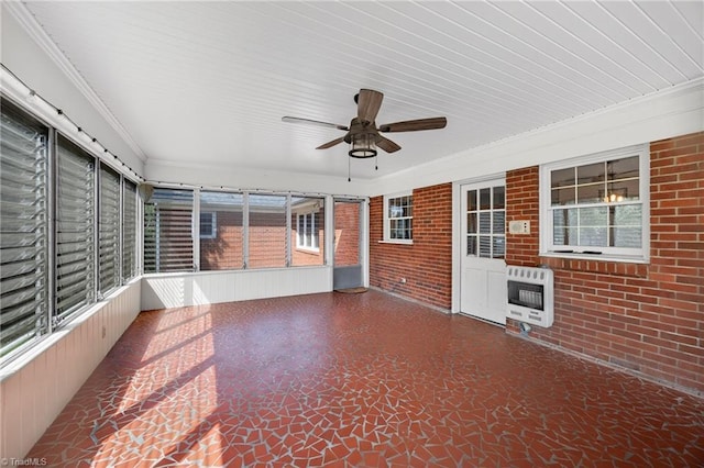 1409 Coventry Rd, High Point, NC 27262 - unfurnished sunroom featuring heating unit and a ceiling fan