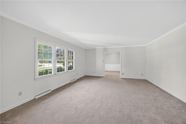 1409 Coventry Rd, High Point, NC 27262 - empty room featuring baseboard heating, carpet floors, and crown molding