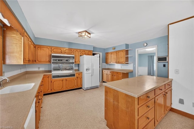 1409 Coventry Rd, High Point, NC 27262 - kitchen with white appliances, open shelves, light countertops, and a warming drawer