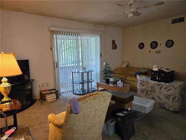 2205 Sunderland Rd Unit 107D, Winston-Salem, NC 27103 - living area featuring a ceiling fan and carpet