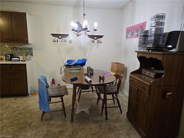 2205 Sunderland Rd Unit 107D, Winston-Salem, NC 27103 - dining space with a chandelier and tile patterned floors