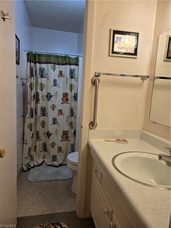 2205 Sunderland Rd Unit 107D, Winston-Salem, NC 27103 - full bath with vanity, toilet, and a shower with shower curtain