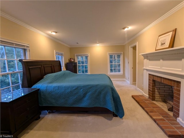 bedroom with light carpet, crown molding, and a fireplace