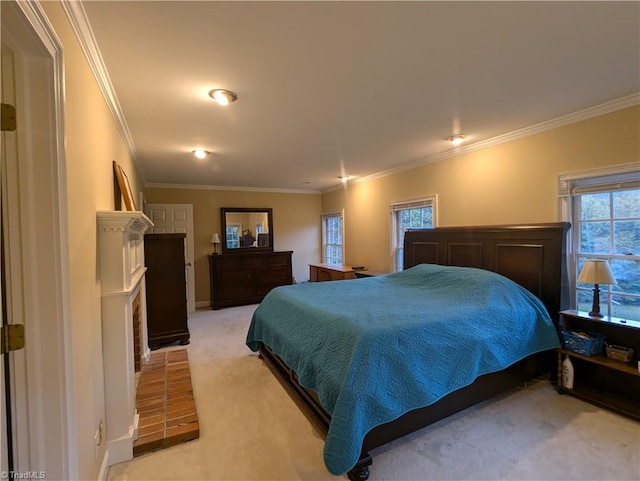 carpeted bedroom with crown molding and a fireplace