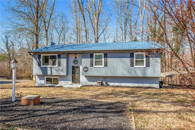 bi-level home with metal roof