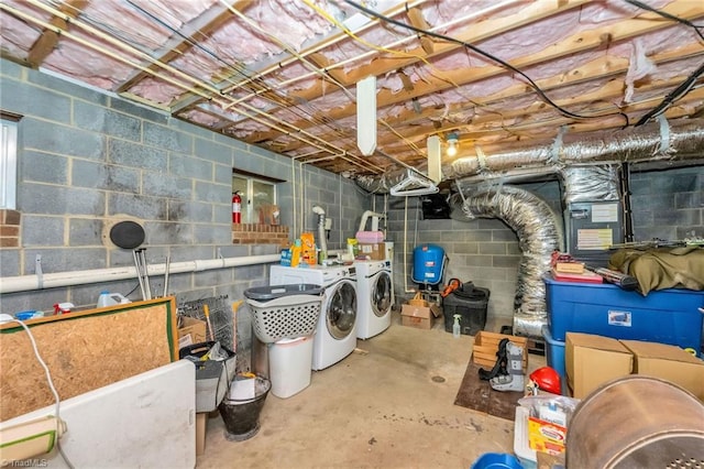 unfinished basement featuring washer and clothes dryer