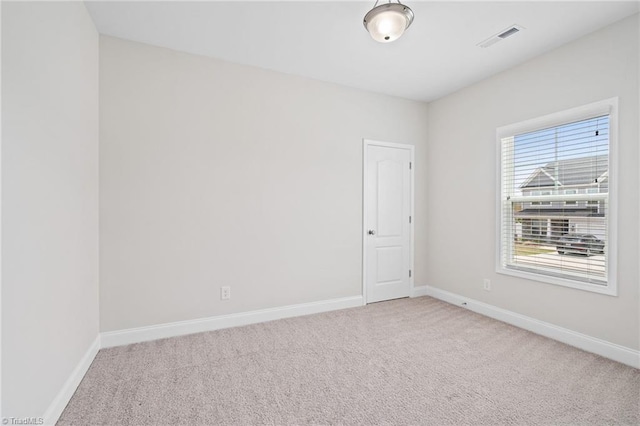 empty room with carpet floors