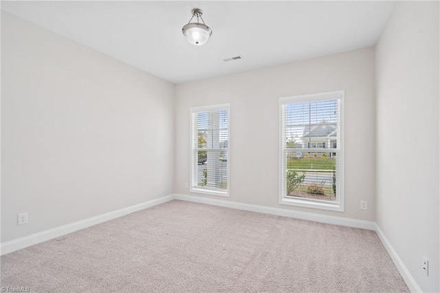 view of carpeted spare room