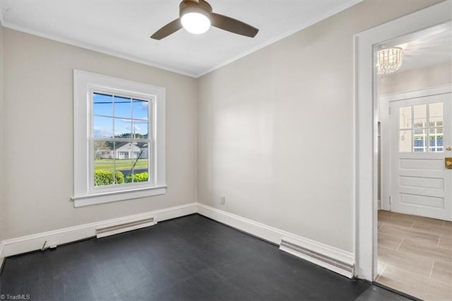 spare room with ceiling fan with notable chandelier and ornamental molding