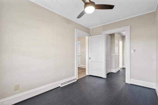 unfurnished bedroom featuring ceiling fan and crown molding