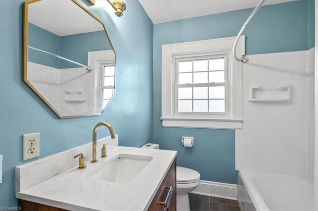 full bathroom featuring vanity, shower / tub combination, tile patterned floors, and toilet