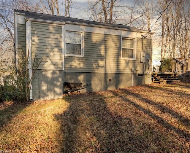 view of home's exterior with crawl space