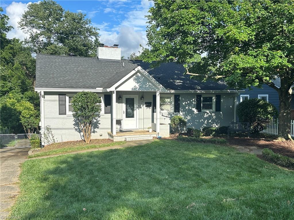 1327 Irving St, Winston-Salem, NC 27103 - ranch-style house featuring a chimney and a shingled roof