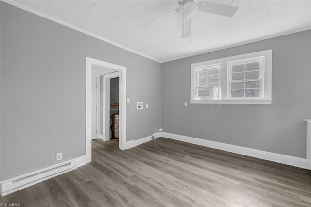 unfurnished room featuring a baseboard radiator, cooling unit, hardwood / wood-style flooring, ceiling fan, and crown molding