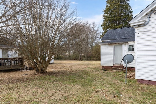 view of yard featuring a deck