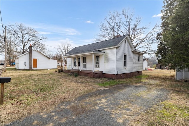 bungalow featuring covered porch