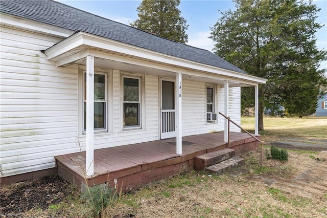 doorway to property featuring covered porch