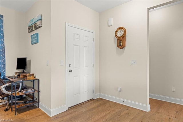 entrance foyer with light hardwood / wood-style floors