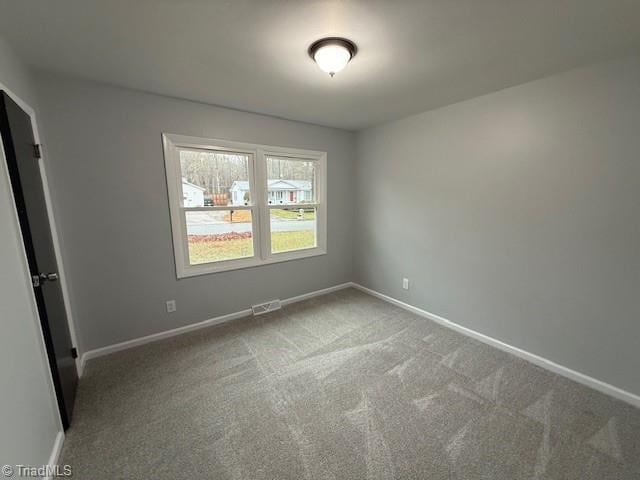 view of carpeted spare room