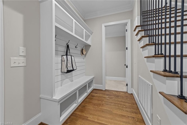 8441 Alice Player Dr, Oak Ridge, NC 27310 - mudroom featuring crown molding, wood finished floors, and baseboards