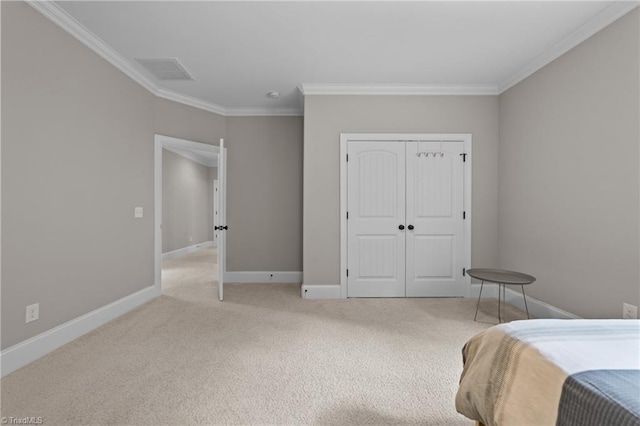 8441 Alice Player Dr, Oak Ridge, NC 27310 - bedroom featuring ornamental molding, light colored carpet, baseboards, and a closet