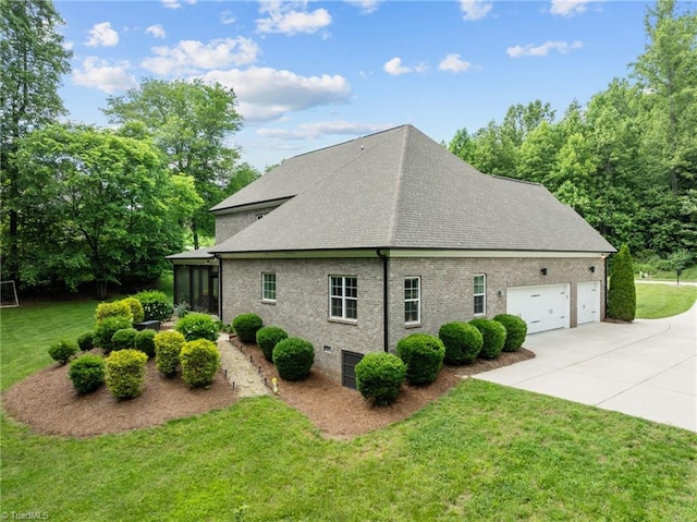 8441 Alice Player Dr, Oak Ridge, NC 27310 - view of home's exterior featuring a sunroom, driveway, a yard, roof with shingles, and a garage