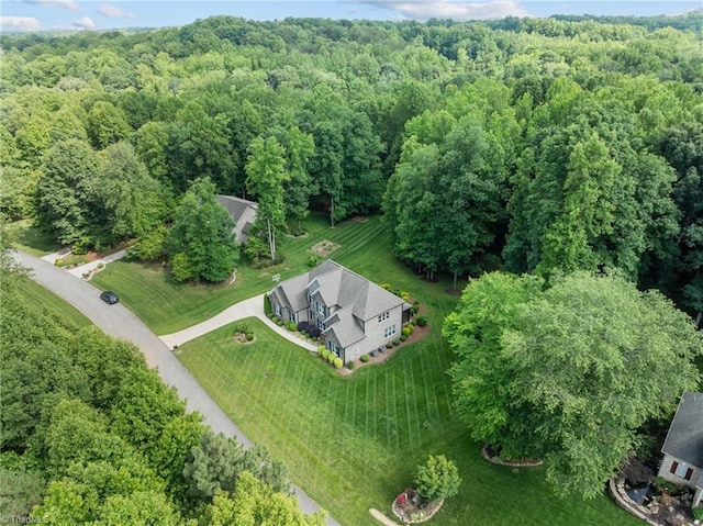 8441 Alice Player Dr, Oak Ridge, NC 27310 - view from above of property with a heavily wooded area
