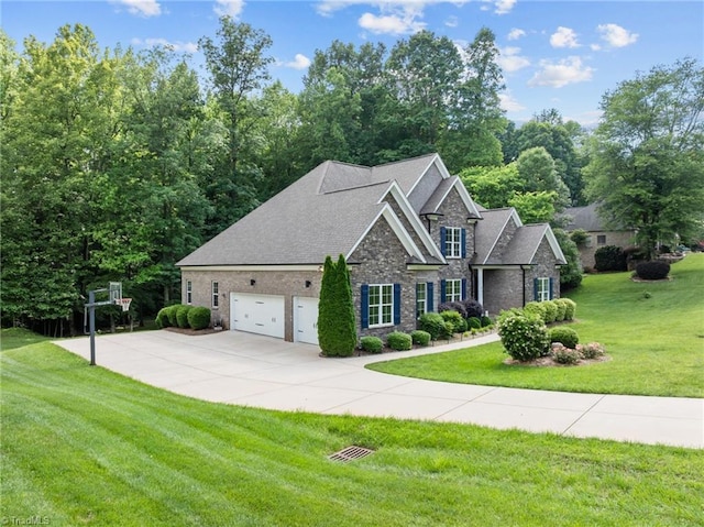 8441 Alice Player Dr, Oak Ridge, NC 27310 - view of front of property with a front yard, stone siding, driveway, a shingled roof, and a garage